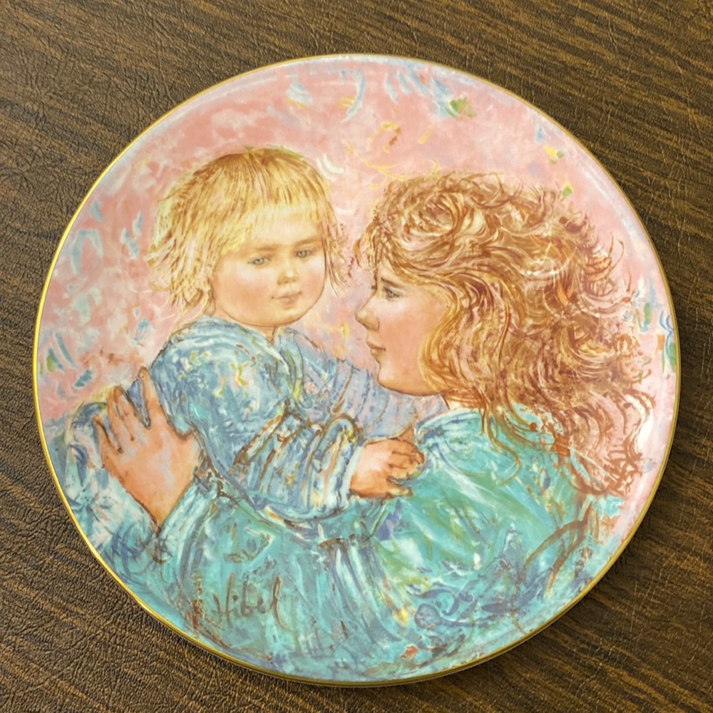 Edna Hibel collectible plate series of mother and child